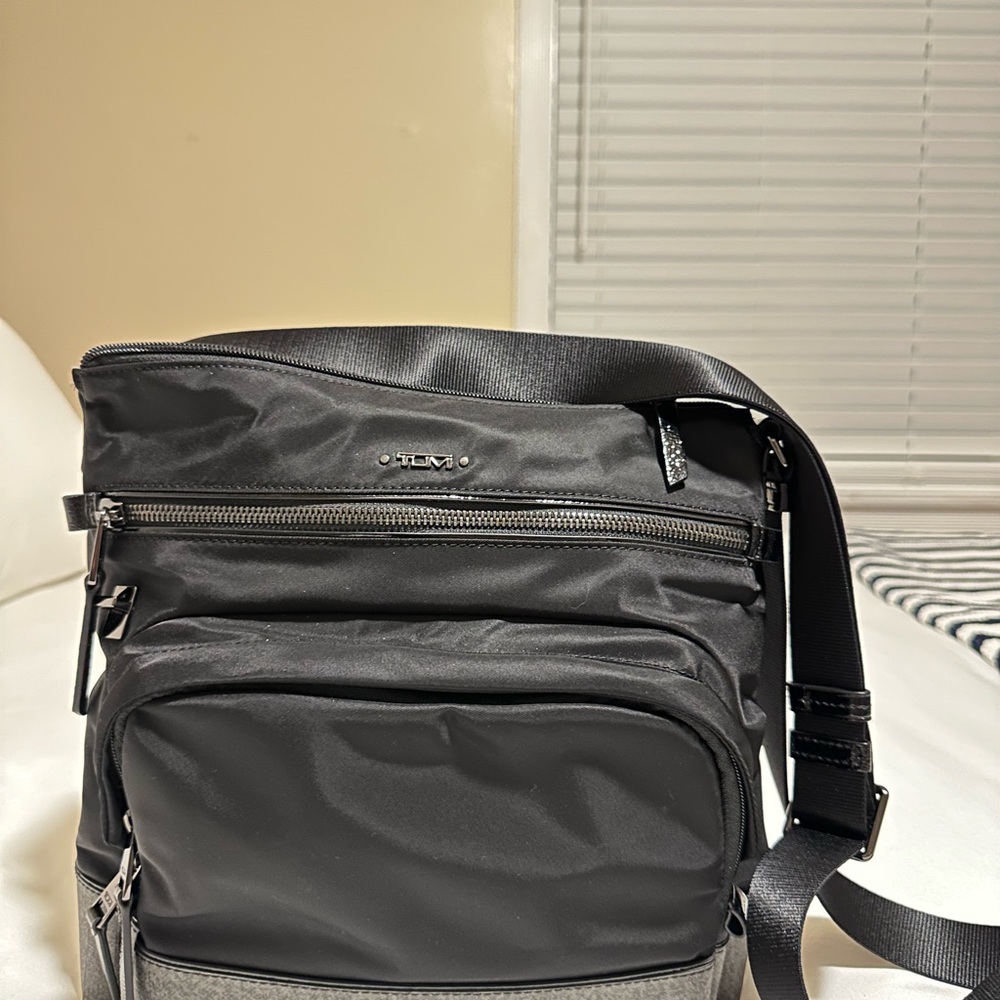 Tumi Voyager crossbody gun metal cross- like new, used 2x